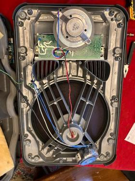 The inside of a JBL EON15 powered speaker. 